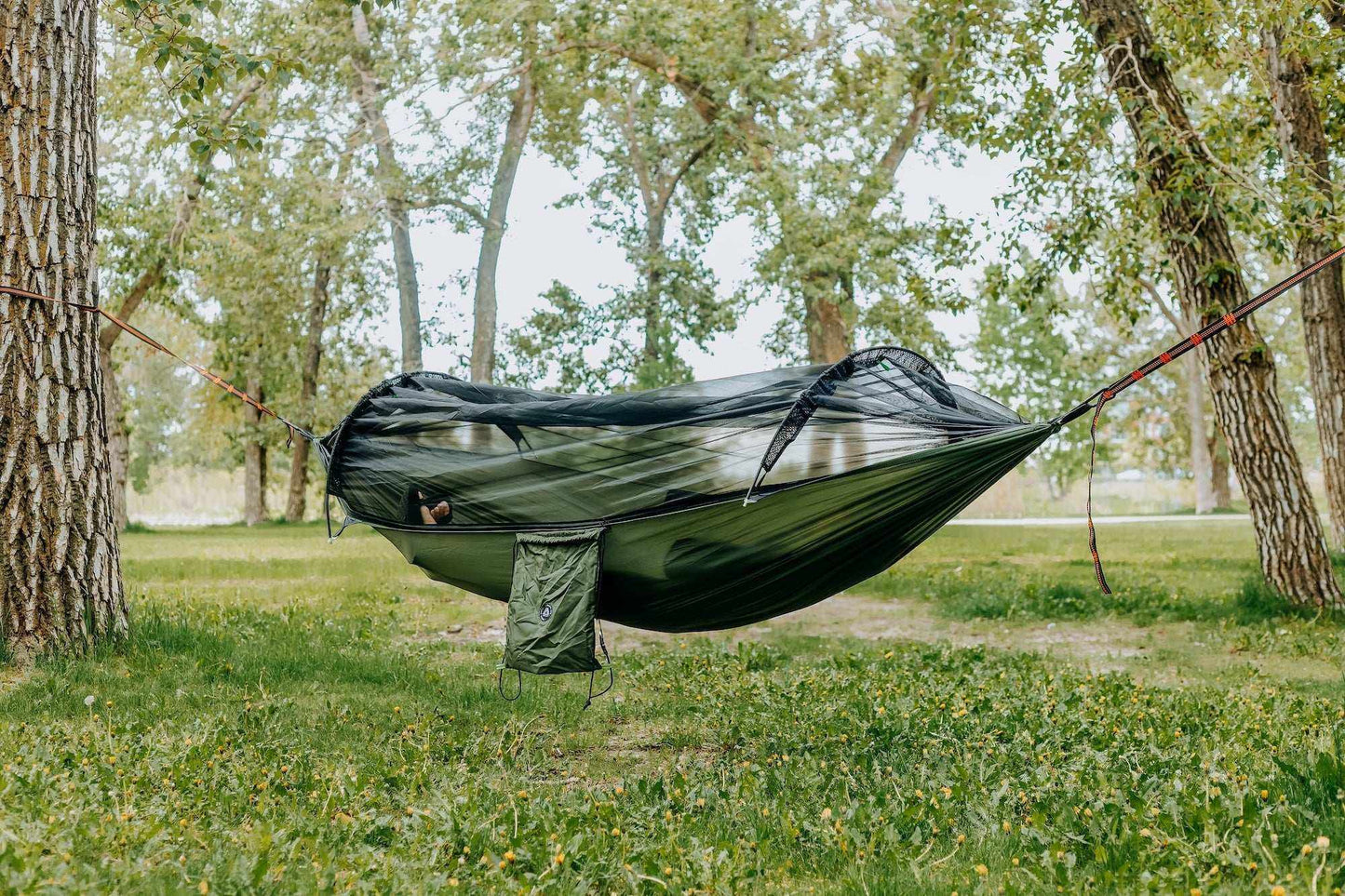 Grey Erebus camping hammock with mosquito net for outdoor relaxation and bug protection