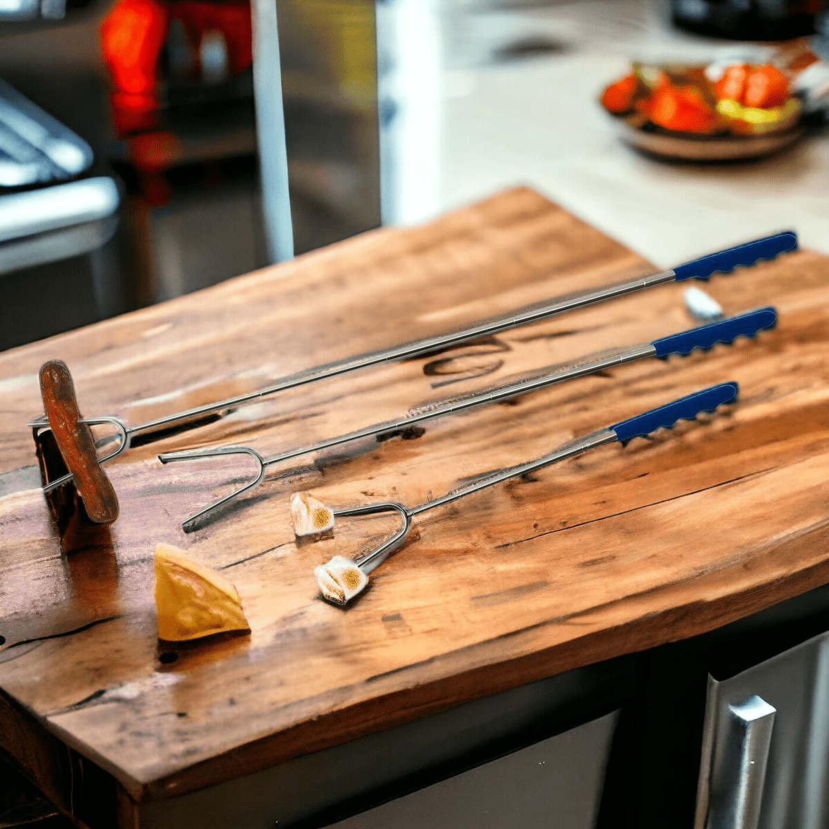 Fireside camping essentials including cooking tools for roasting and grilling over a campfire.